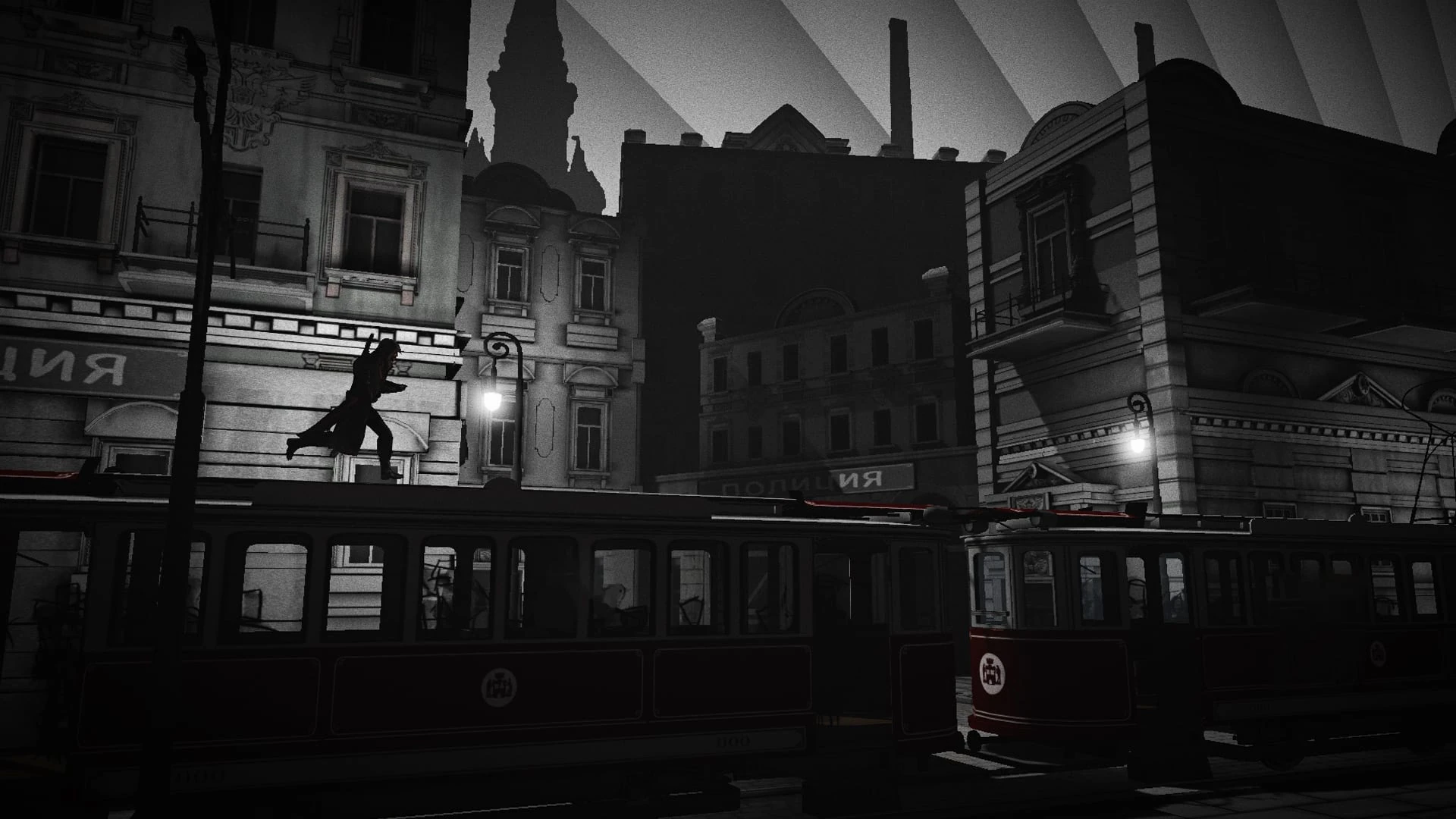 Una figura corre por el techo de un tranvía en una calle nocturna de edificios en blanco y negro