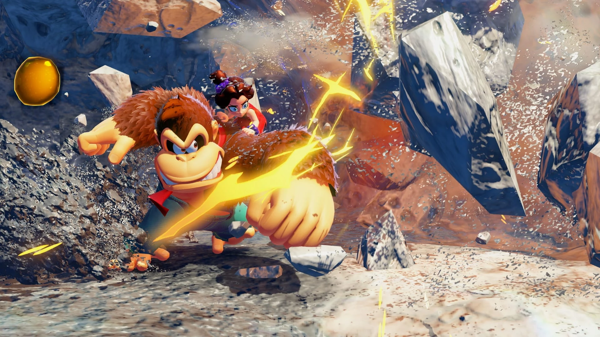 Donkey Kong lanza un puñetazo que parte la roca, con Pauline agarrada a su espalda