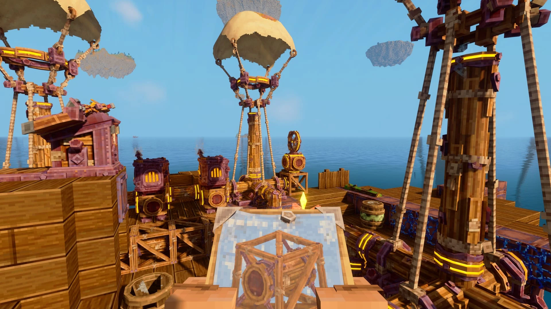 La cubierta de madera de una nave voladora, con globos de tela, mástiles, cajas y una mesa con un mapa, sobre un mar azul