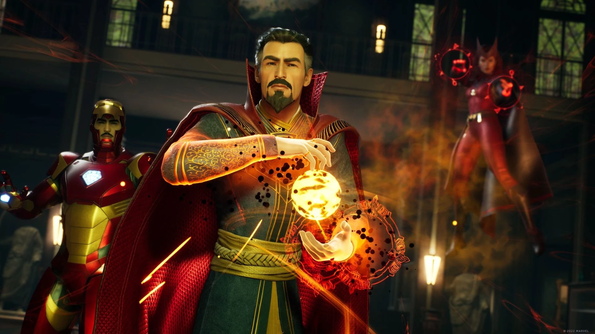 Doctor Strange, con capa roja, sostiene una esfera de fuego mágico; detrás, Iron Man y la Bruja Escarlata flotando
