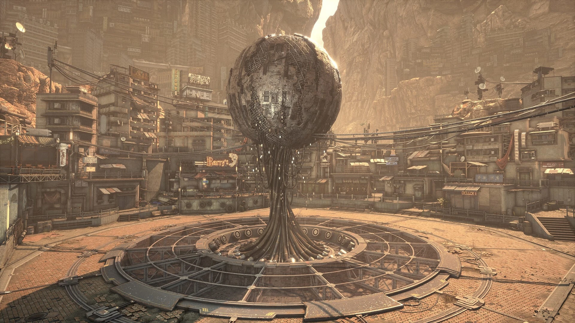 Una plaza circular de piedra con una gran esfera metálica sostenida por un tronco de cables, rodeada de casas apiñadas en las paredes de un cañón